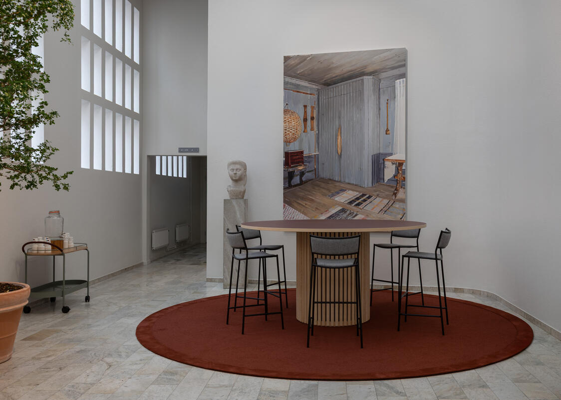 Folksam Headquarters, Stockholm – Interior Photography Interior photography of Fontänhallen at Folksam headquarters in Stockholm, featuring marble walls, geometric stone flooring and Brunnen, a ceramic fountain sculpture by Swedish designer Stig Lindberg.
